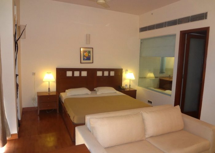 Spacious bedroom with living of a studio apartments at Osaka Serviced Apartments.